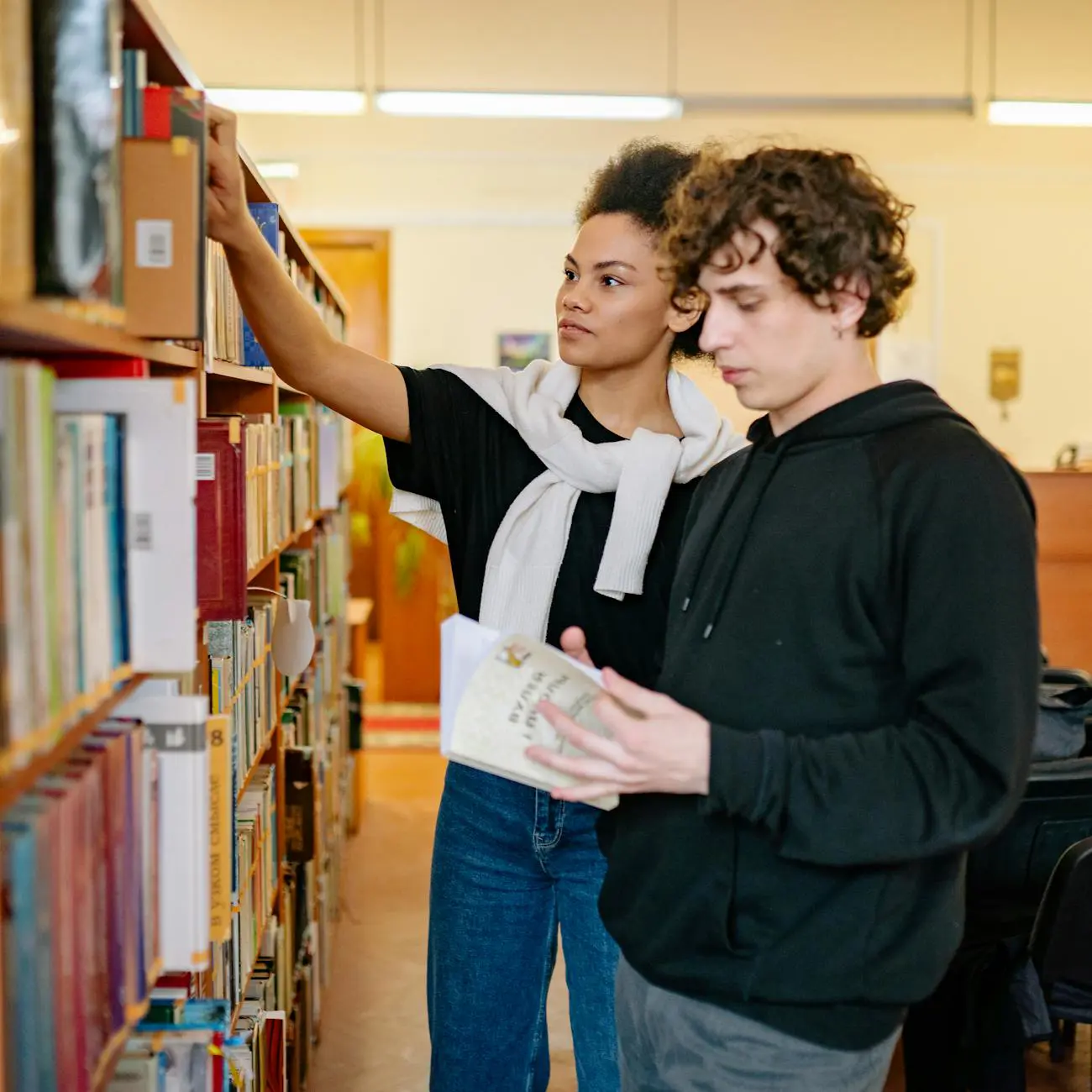 Students conducting academic research in a university library