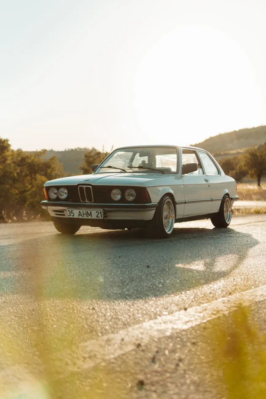 Car on a sunny road representing autonomous vehicle technology
