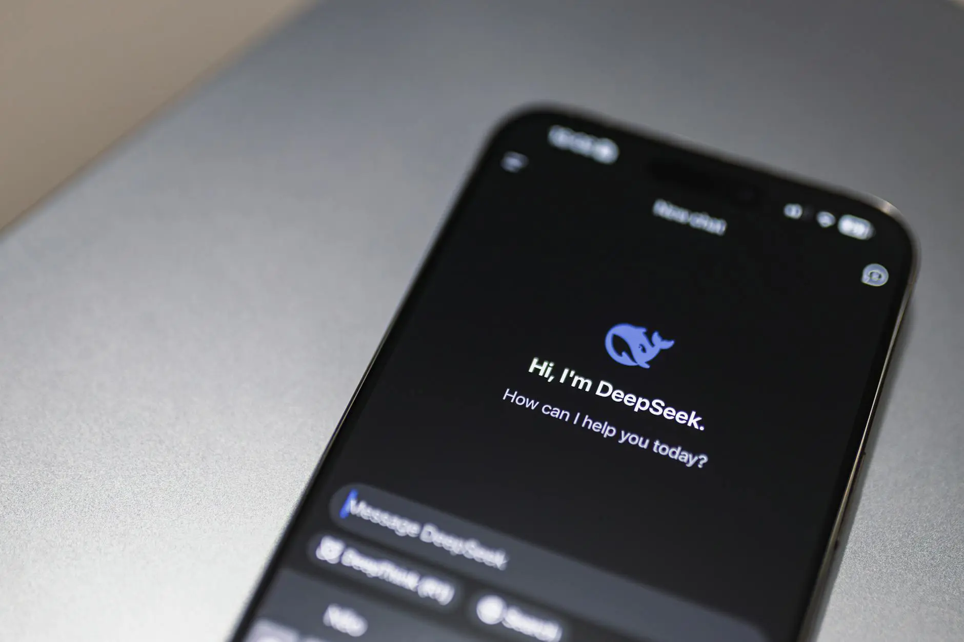 Smartphone displaying an AI chatbot interface for business customer support