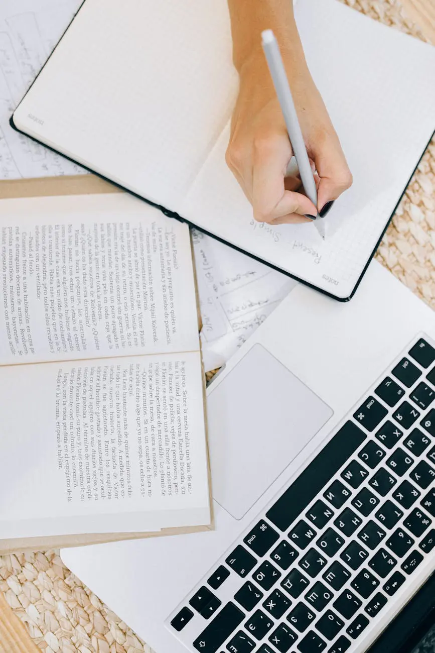 A writer working on a book with a laptop and notebook, representing the AI-assisted book writing process