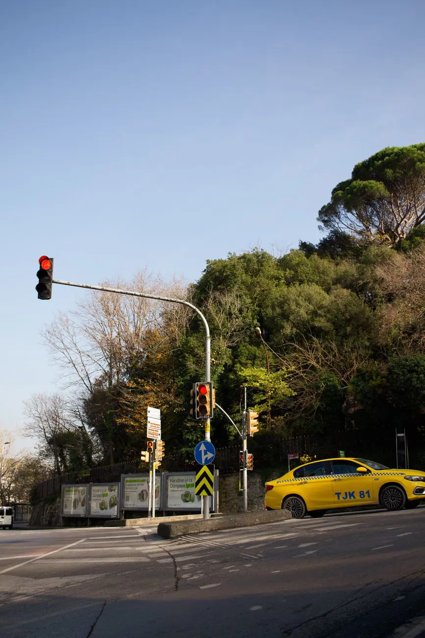 A yellow taxi at a street corner in Istanbul, Turkey
