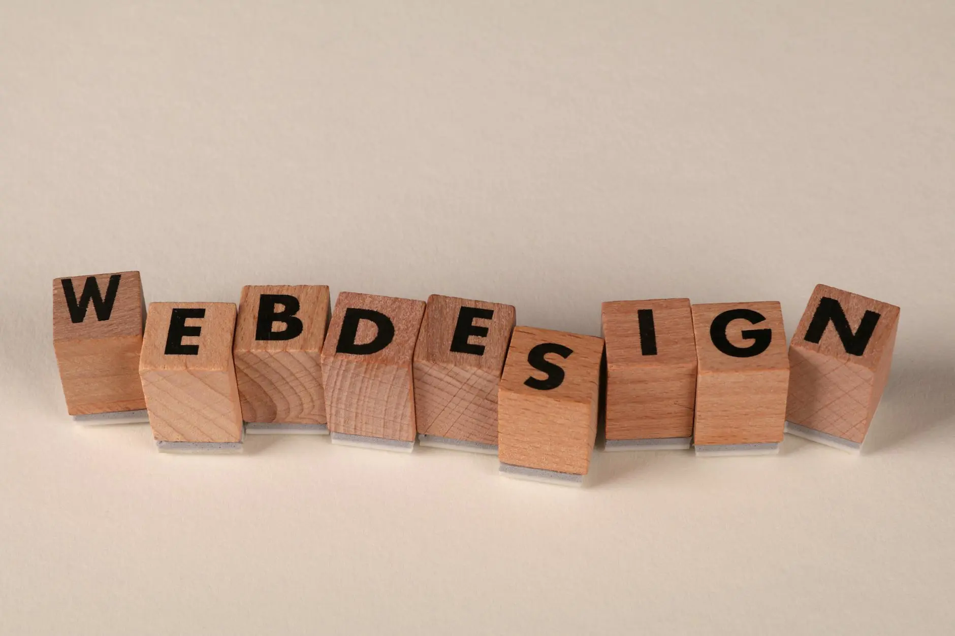Wooden blocks spelling web design representing typography in digital design